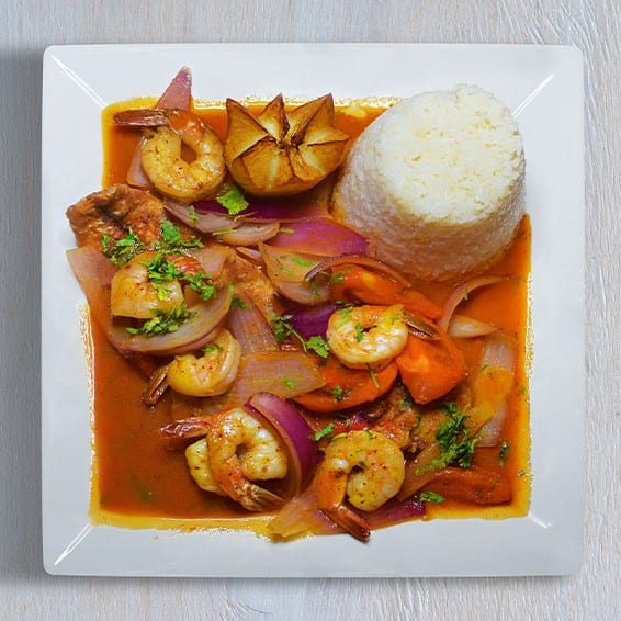 Corvina a la Chorrillana Con Camarones.