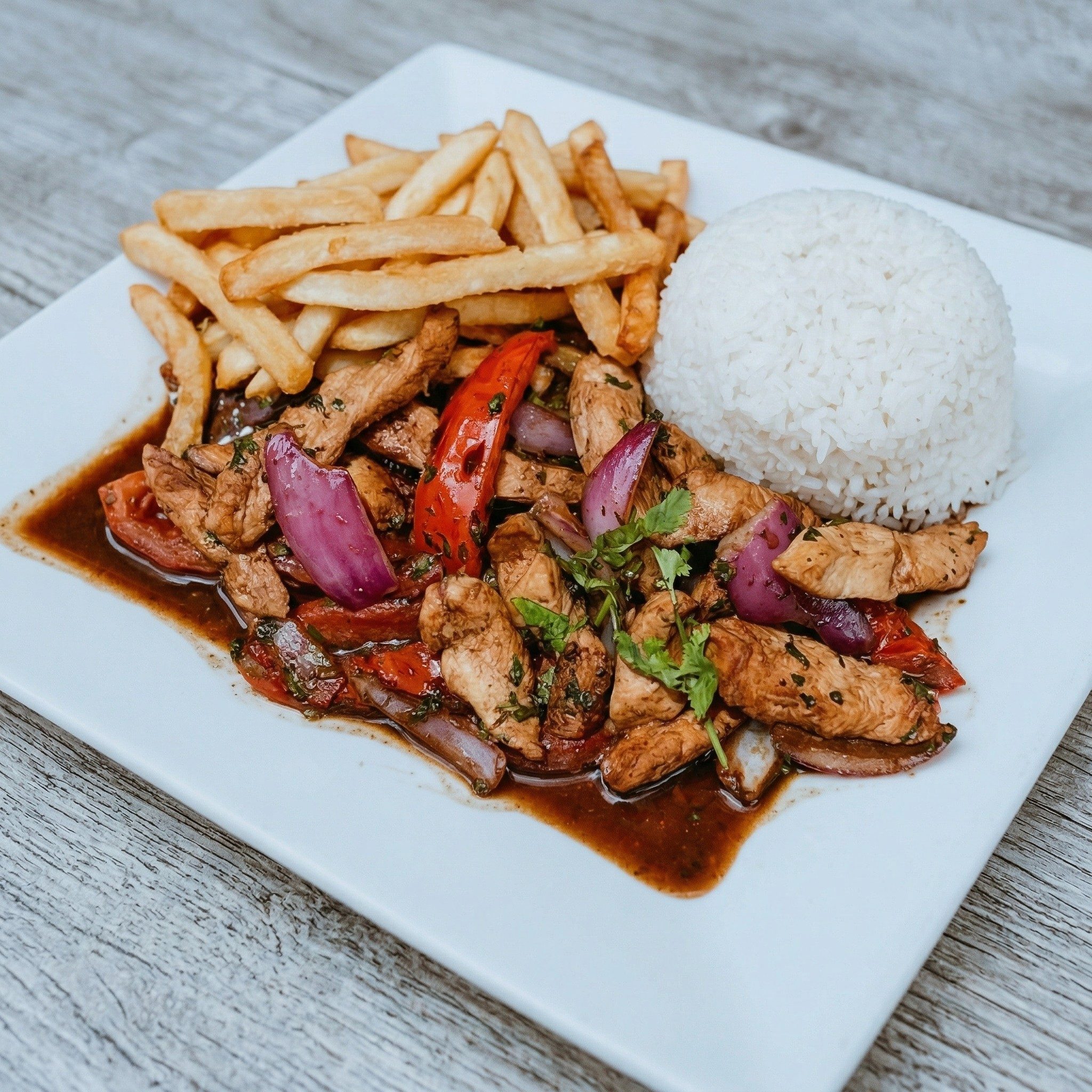 Pollo / Chicken Saltados Al Wok.